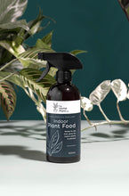 Load image into Gallery viewer, The Home Plant Co Indoor plant food foliar spray in a bottle surrounded by plants
